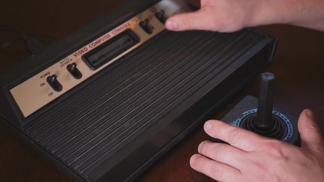 Playing With Vintage Video Computer Console TV Game Joystick. 4K Footage