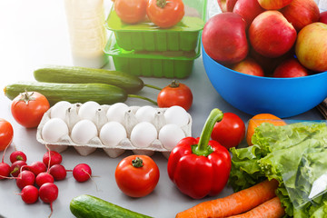 healthy food background, vegetables, fruits, eggs and dairy products on white table, top view