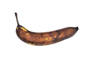 Brown rotten banana isolated on white background.
