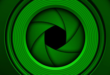 Technology background, green camera photo lens with shutter