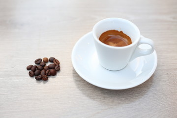 Coffee Bean and cup for wooden background