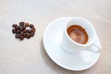 Coffee Bean and cup for wooden background