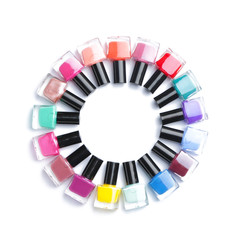 Fototapeta premium Different nail polishes on white background