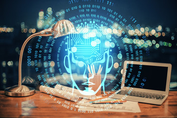 Multi exposure of work space with computer and human brain hologram. Brainstorm concept.