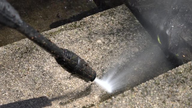 Cleaning stairs with a high pressure cleaner
