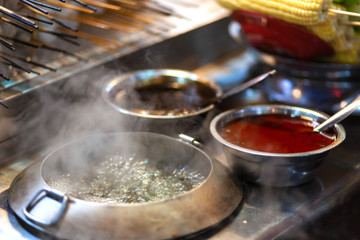 Spicy snack sauces in metal bowls. Asian cuisine