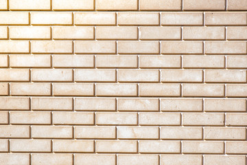 Fototapeta premium The wall is made of bricks. Beautiful texture and background.