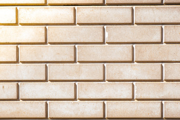 The wall is made of bricks. Beautiful texture and background.