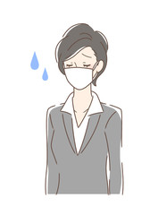 マスクを付けた苦しそうな女性