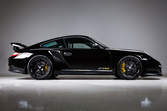 Side shot of a black Porsche GT3RS shot in a studio on March 3, 2017 in London, U.K.