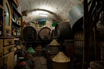 Fototapeta na wymiar Old italian wine cellar in an old building