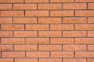 The wall is made of bricks. Beautiful texture and background.