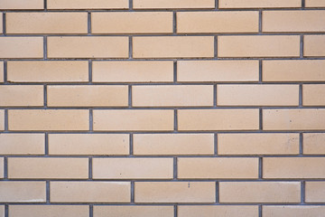 The wall is made of bricks. Beautiful texture and background.