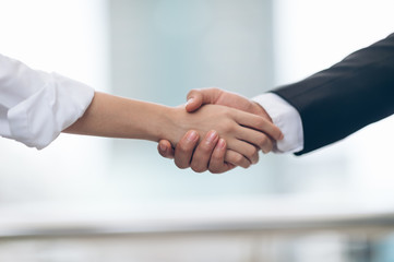 Confidence of businessmen by handshake