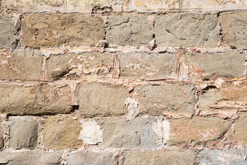 The wall is made of bricks. Beautiful texture and background.