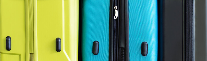 Colorful travel bags background texture.
