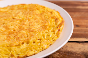 Homemade spaghetti omelette. Complete dish, nutritious and typically suitable for those who practice sports. Protein food, good fats food.