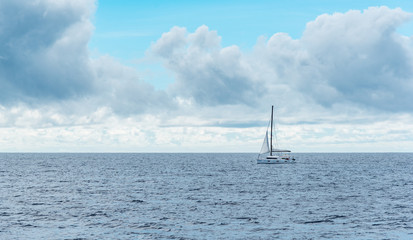 Sailing yacht in the ocean.