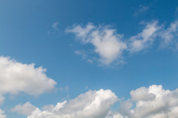 Bright blue sky with moderate cloud in a tropical area during winter time