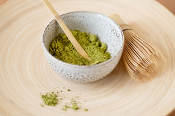 Matcha green tea powder grey bown japanese tools.