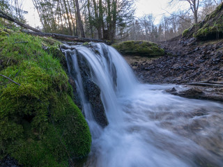 Fototapeta na wymiar View of forest waterfall, deep forest waterfall landscape.