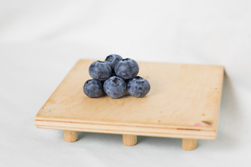 blueberries on a wooden table