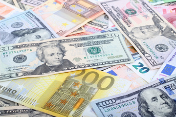 many dollar and euro banknote as background.