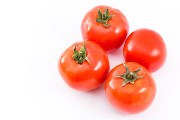 red ripe tomatoes isolated on white background