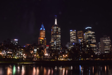 Fototapeta na wymiar The cityscape of Melbourne city near Yarra river at night in Australia