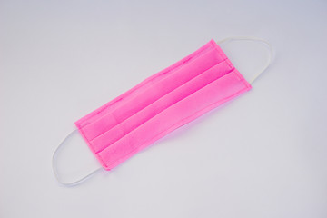 pink mask isolated on white background