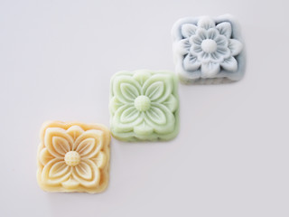 Top view of colorful snow lotus dessert, mooncake bua hema isolated on white background.