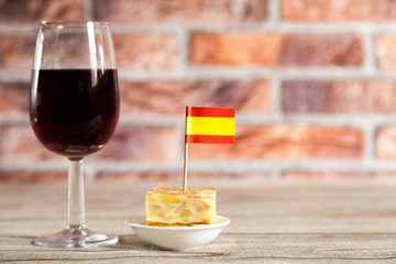 Spanish omelette brochette with spanish flag and red wine