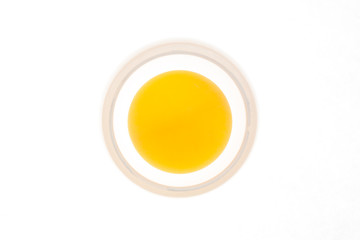 Yellow ball in the centre of white circle on a white background
