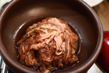 The raw meat with in the wooden bowl in the restaurant in Melbourne, Australia