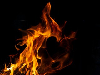 Hot fire with flames and black background