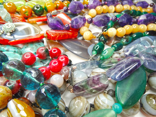 jewelry fashion beads necklace background with colorful crystals