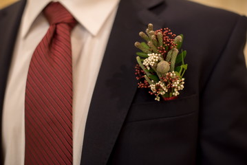 Groom's boutonniere at the wedding
