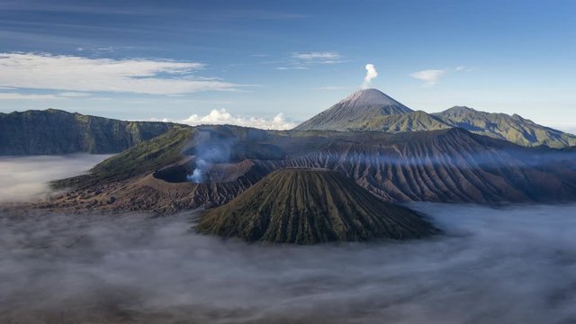 Bromo active volcano mountain with sea of fog in a morning sunrise. Bromo mountain located in east Java island in Indonesia, Asia