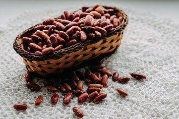 beans in a basket on a white table