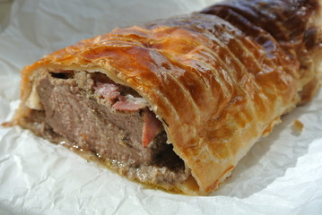 Meat pie, golden fried crust juicy filling appetizer pie.