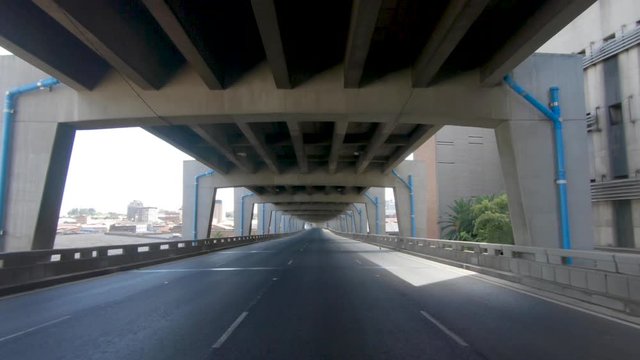 A tracking shot on the M1 Double-Decker highway in Johannesburg to show how empty and quiet the city is during the Covid-19 Coronavirus lockdown. 