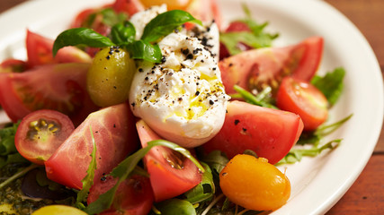 fresh salad with tomatoes and mozzarella