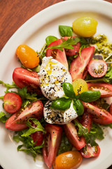 fresh salad with tomatoes and mozzarella