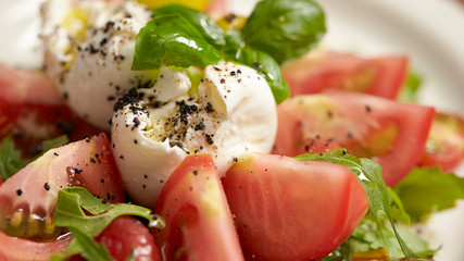 fresh salad with tomatoes and mozzarella