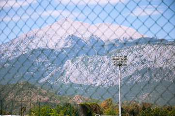 Mountain view through a grid
