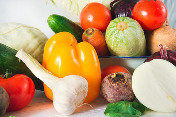 many  fresh vegetables, pepper,  tomato, onion,  cucumber, zucchini, potatoes, beets, herbs,  garlic,  spinach,