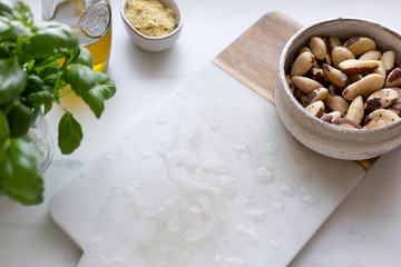Pesto Ingredients  on White marble Background