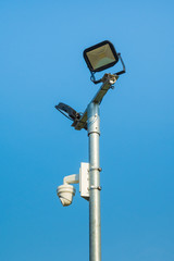 CCTV Security camera with floodlights mounted on pole