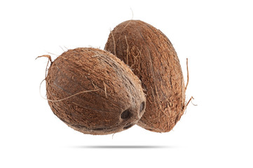  closeup of coconut with sticking fibers isolate on white background