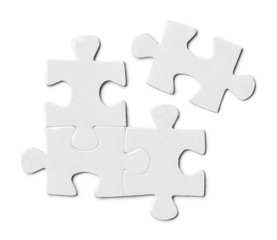 Close-up of puzzle pieces, isolated on white background